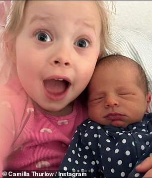 Nell and Nora also seemed overjoyed to meet their baby brother as they cuddled him in adorable photos