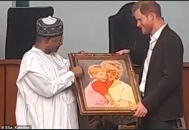 He was also shown two paintings: one of him and his late mother Princess Diana and one of him and his wife Meghan