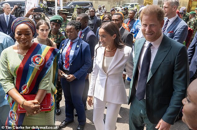 Harry and Meghan during their tour of the Nigerian capital Abuja on Friday