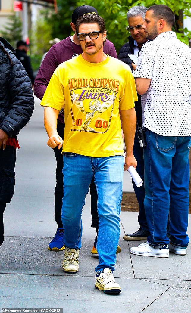 Pedro was spotted on set wearing a vintage yellow Lakers T-shirt and jeans