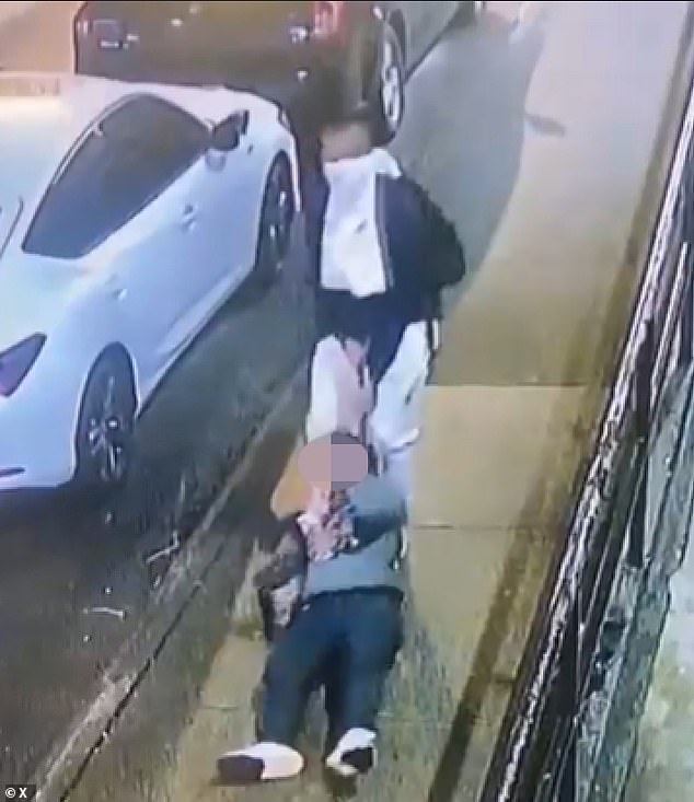 Surveillance footage shows the man dragging the victim's limp body between two parked cars