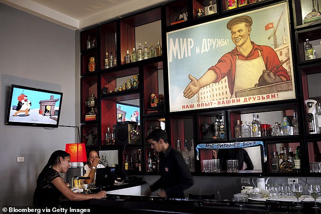 A bartender works at Na Zdorovie!, a Russian-themed restaurant and bar in Havana