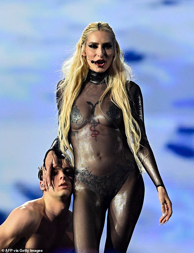 Slovenian singer Raiven left viewers shocked with her long, see-through bodysuit that left little to the imagination