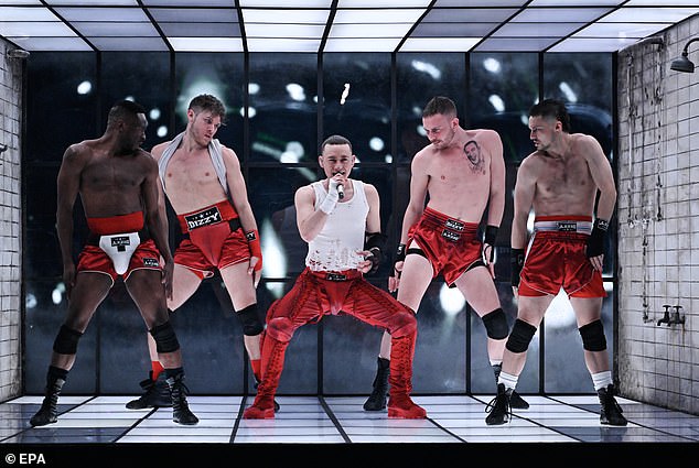 Britain's Olly Alexander was surrounded by scantily clad male dancers, all performing provocative dance moves and suggestive near-kisses.