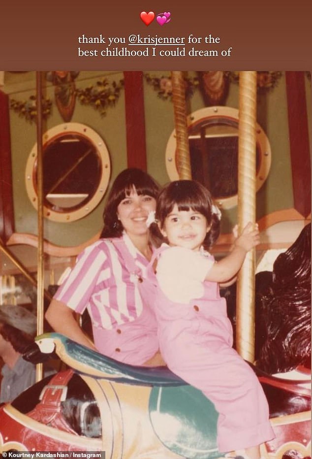 Kourtney shared a throwback photo of herself and Kris enjoying a carousel ride.  Both she and her mother wore matching pink overalls.  'Thank you @krisjenner for the best childhood I could dream of'