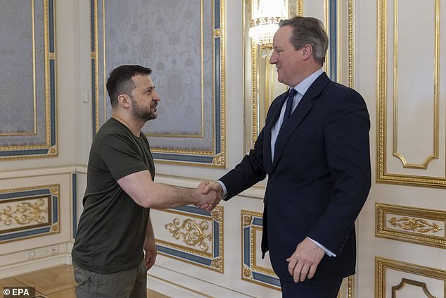 Foreign Secretary Lord Cameron, pictured with Ukrainian President Volodymyr Zelensky, visited Kiev to pledge Britain would provide £3 billion a year to Ukraine for as long as needed