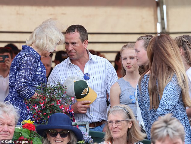 During the Badminton Horse Trials, Peter was seen warmly greeting the King's wife, Queen Camilla