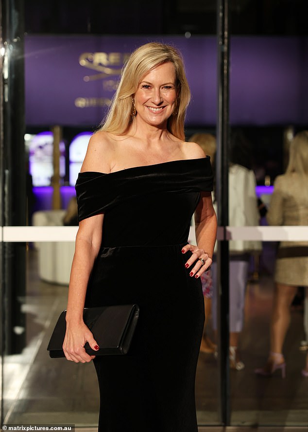 The breakfast television presenter carried an oversized black clutch