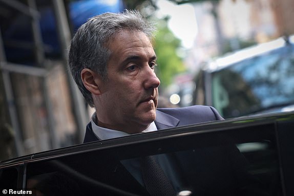 Michael Cohen, former lawyer for Republican presidential candidate and former US President Donald Trump, leaves his Manhattan home to testify in Trump's criminal trial on charges that he falsified business records to hide money paid to porn star Stormy Daniels in 2016 to silence, in New York City, US, May 13, 2024. REUTERS/Mike Segar