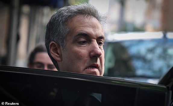 Michael Cohen, former lawyer for Republican presidential candidate and former US President Donald Trump, leaves his Manhattan home to testify in Trump's criminal trial on charges that he falsified business records to hide money paid to porn star Stormy Daniels in 2016 to silence, in New York City, US, May 13, 2024. REUTERS/Mike Segar