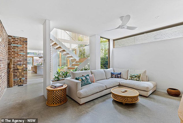 The house is described as 'masterpiece' a stone's throw from Coogee and Clovelly beaches in the city's eastern suburbs