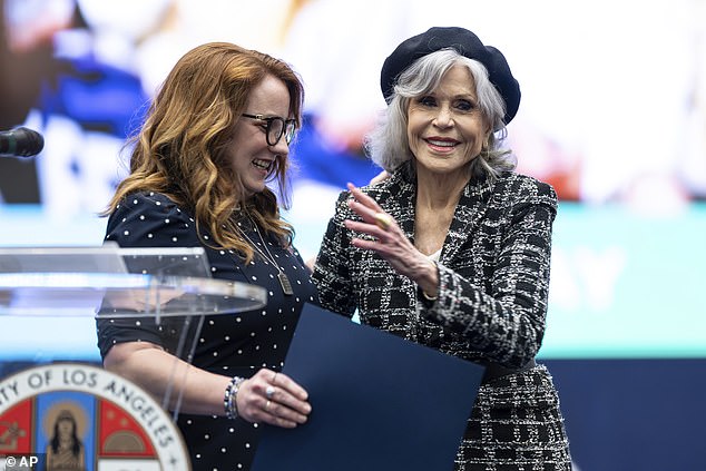 Horvath, left, hands Jane Fonda a proclamation that it is April 30 "Jane Fonda Day" in Los Angeles County