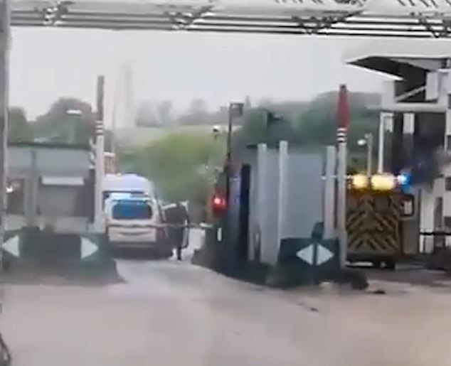 Emergency services were spotted at the toll booth this morning following the ambush that killed three French officers