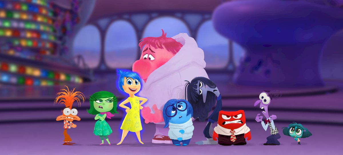 Concept art showing the full range of emotions in Inside Out 2: Anxiety, an orange muppet-like figure;  Disgust, a little green woman;  Joy, a yellow smiling figure;  Shame, a huge, hulking pink figure;  Sadness, a round and blue figure;  Ennui, a hanging indigo figure;  Anger, a red block;  Fear, a squiggly purple figure;  and Envy, a turquoise blob.