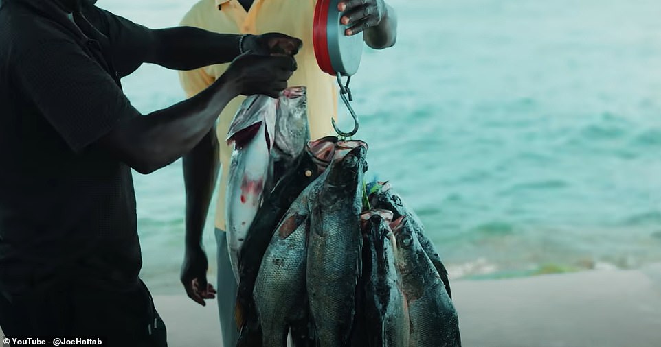 One of the filmmaker's ports of call on the Migingo are the fishing ports, where he sees the fishermen in action