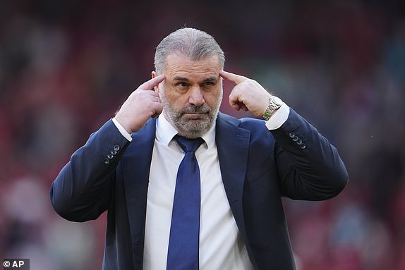 Tottenham's head coach Ange Postecoglou gestures as he leaves the pitch at the end of the English Premier League football match between Liverpool and Tottenham Hotspur at Anfield Stadium in Liverpool, England, Sunday, May 5, 2024. (AP Photo/Jon Super)