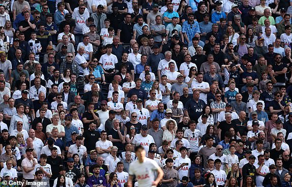 LONDON, ENGLAND - MAY 11: Heung-Min Son of Spurs is watched by Spurs fans during the Premier League match between Tottenham Hotspur and Burnley FC at Tottenham Hotspur Stadium on May 11, 2024 in London, England.  (Photo by Julian Finney/Getty Images)