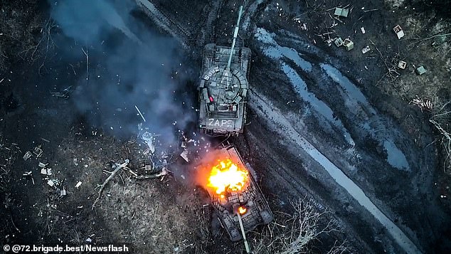 Russian tank explodes after being hit by a bomb dropped by a drone in Ukraine