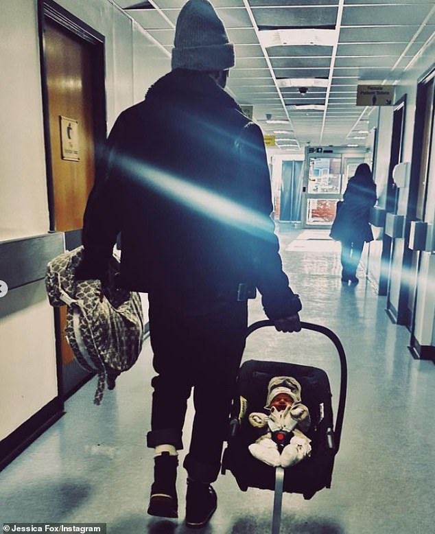 Another photo showed Nicholas proudly carrying their baby out of the hospital, while she also shared a close-up photo of River's hospital ID bracelet, which showed he was born on March 7.