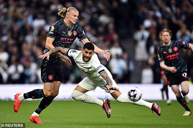 Cristian Romero (right) was responsible for Erling Haaland's (left) first goal in the 52nd minute