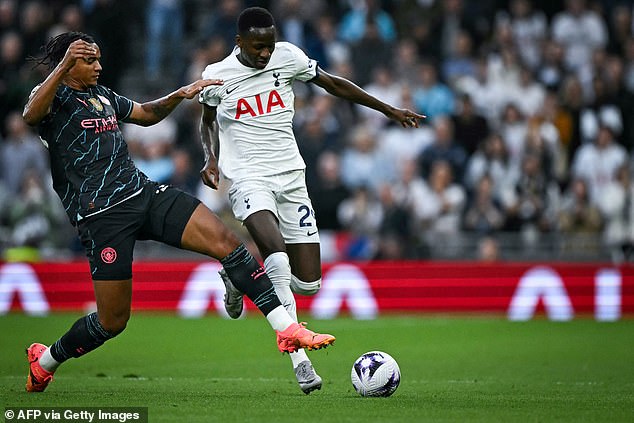 Pape Matar Sarr (right) was asked to make a huge shift as a false nine, but doubled in midfield