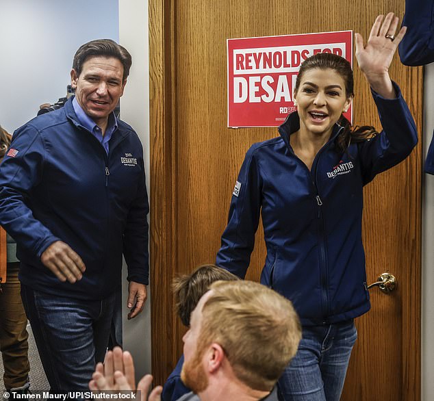 Casey DeSantis (right) was often at her husband's side during his 2024 presidential run. Here, she and Florida's governor (left) visit volunteers in Iowa in the days leading up to the caucus