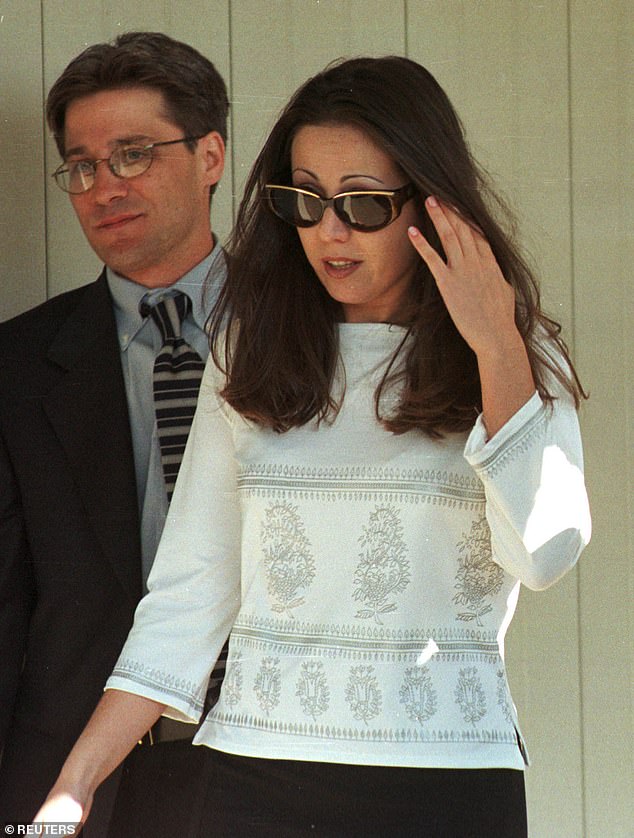 Amy was sentenced to seven years in prison and became a porn star after her release.  (photo: Amy walking out of Albion Women's Correctional Facility with one of her lawyers)