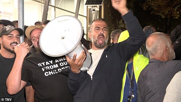 Supporters of the ban on single-sex books are pictured at the protest outside Cumberland Council offices