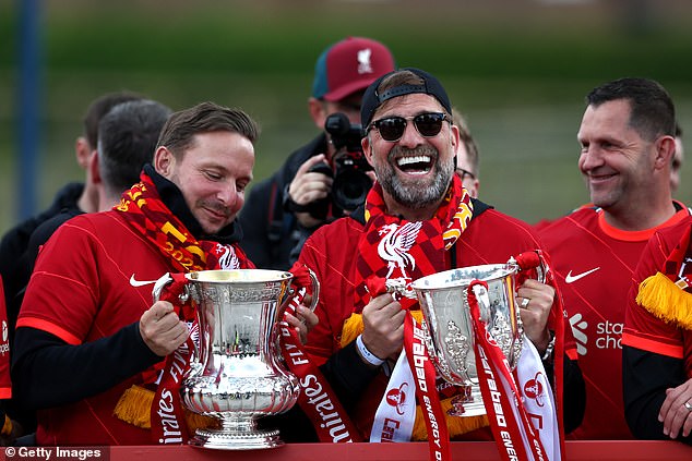 Lijnders (left) won seven trophies during his extremely decorated spell at Liverpool