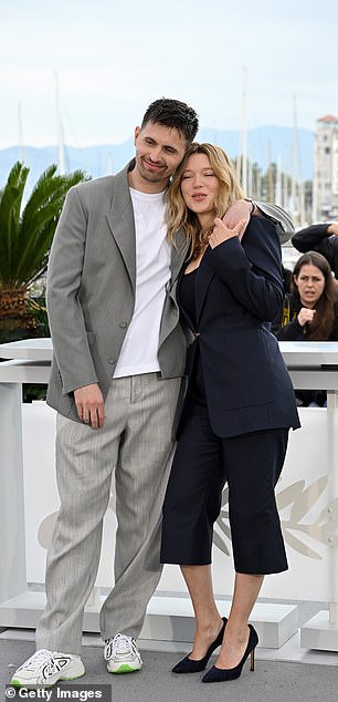 The actress, 38, and Raphaël Quenard put on an animated show for playful snaps during the photocall