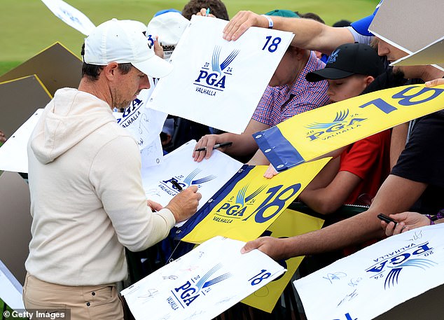 The Northern Irishman signed autographs for fans despite the turmoil in his personal life