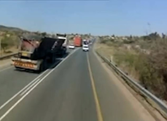 Shocking dashcam footage shows the truck speeding past traffic on the wrong side of the road