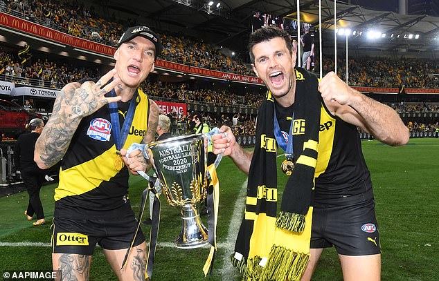 Cotchin (pictured with Martin in 2020) believes his good friend is capable of turning around his form and fitness issues if he puts his mind to it