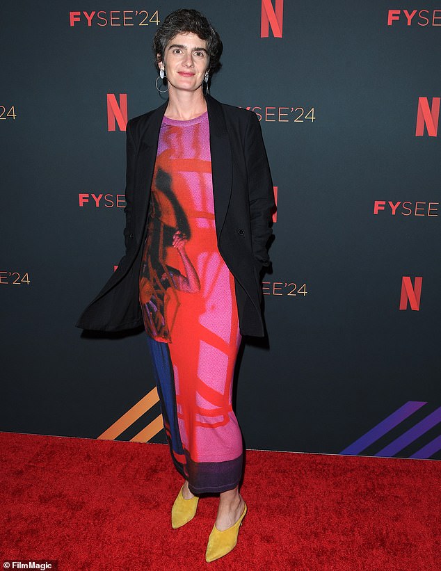 Gaby Hoffmann wore a colorful red dress, a black jacket and yellow heels