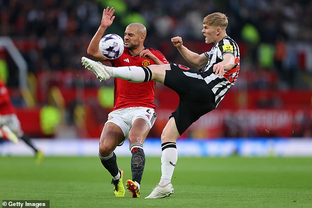 Lewis Hall, 19 (right) saved Newcastle from a 3–1 defeat by scoring the team's second goal in the second minute of stoppage time