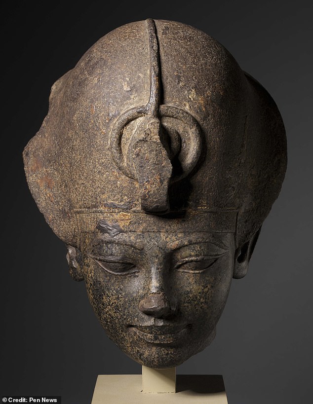 The pharaoh was worshiped as divine during his lifetime and he claimed that the god Amon was his real father, with the name Amenhotep, meaning 'Amon is pleased'.  Pictured: A bust of Amenhotep III at the Cleveland Museum of Art