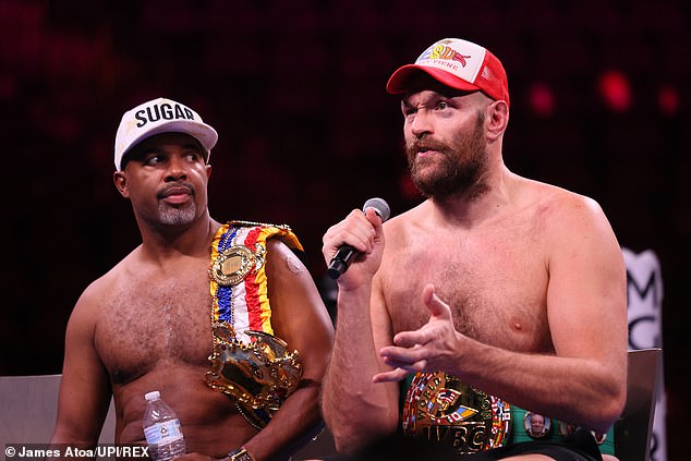 Sugar-Hill Steward (L) revealed he set Fury's hands on fire to strengthen his knuckles