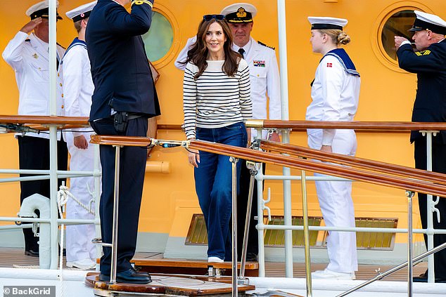 Guards greeted the Australian-born Danish queen as she walked solo during the official state visit to Norway