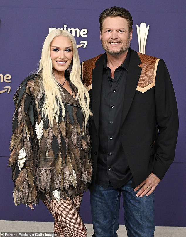 Blake was stylishly casual in classic denim blue jeans and a black shirt that was partially unbuttoned around the collar