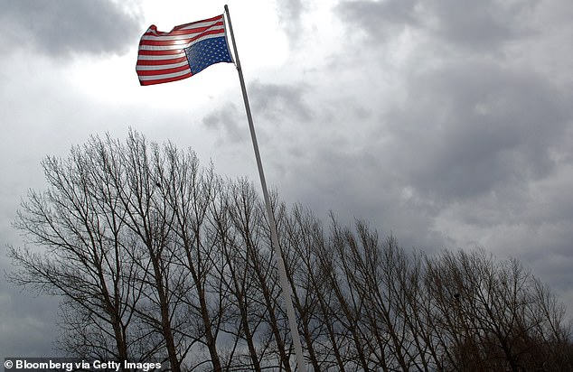 The inverted flag (file photo) has been used as a sign of support for former President Donald Trump's false claims that the 2020 election was stolen from him