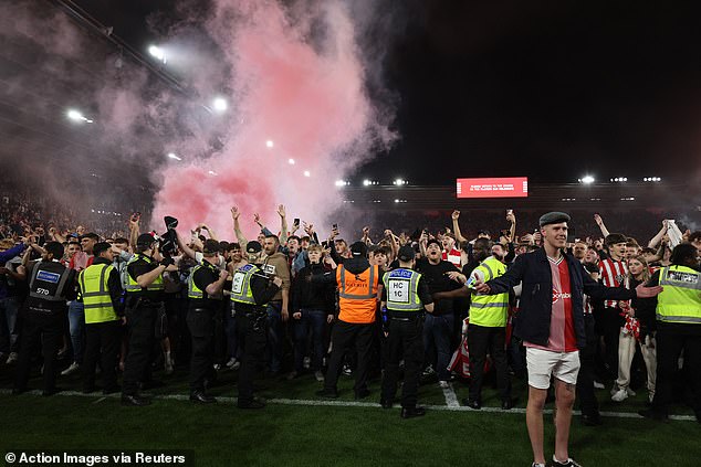 A full-scale pitch invasion began at full-time as Southampton's victory was confirmed