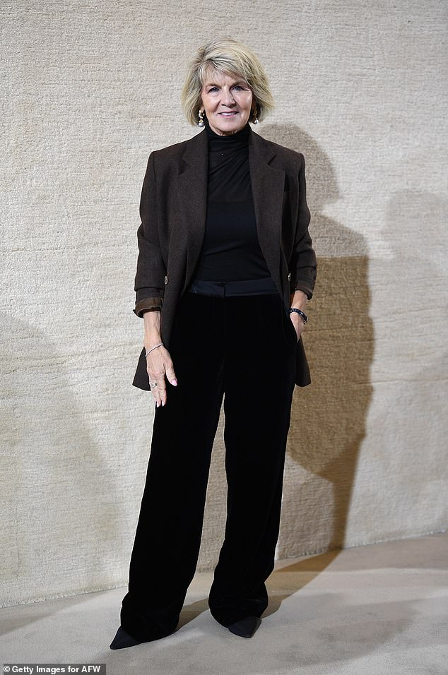 She made a solo entrance at the Viktoria & Woods show at Sydney's Carriageworks on Monday, wearing a brown coat, black turtleneck and trousers