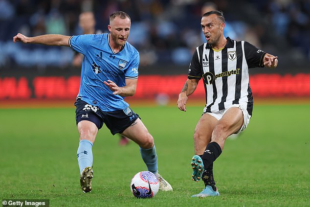 Lewis, right, played for the Macarthur Bulls in the Australian A-League competition