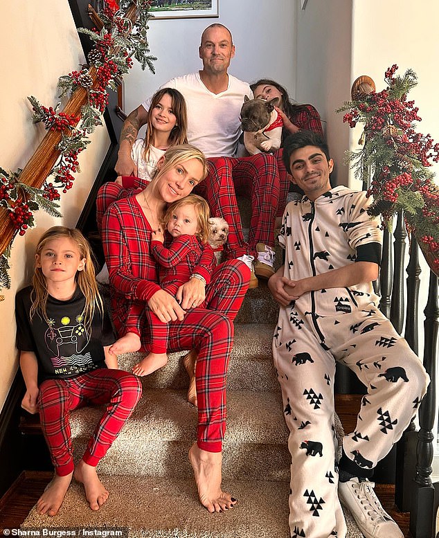 Brian and wife-to-be Sharna posed with their blended family last Christmas;  In addition to his son with Vanessa, the former Beverly Hills, 90210 star shares sons Noah, 11, Bodhi, 10, and Journey, 7, with Megan.  He welcomed a son, Zane, two in June, with Burgess, 38, in 2022