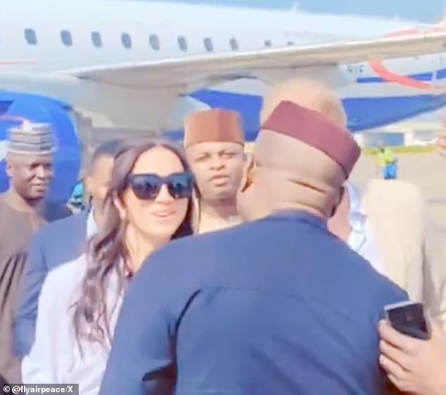 There is no indication that Harry or Meghan were aware of Onyema's history before meeting him.  Meghan is greeted in the photo by Onyema