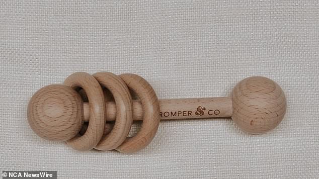 Parents should keep the wooden dumbbell rattle out of the reach of children.