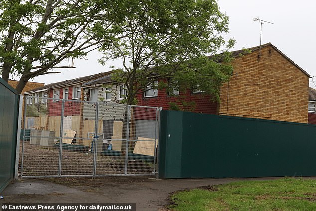 In the photo: abandoned buildings cordoned off awaiting demolition