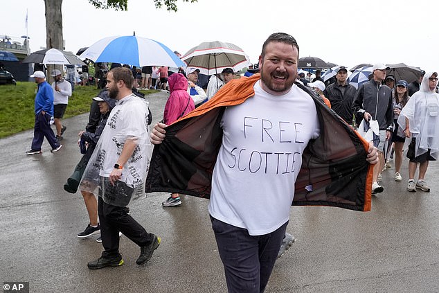 One t-shirt read 'Free Scottie', while Scheffler now reportedly faces four criminal charges