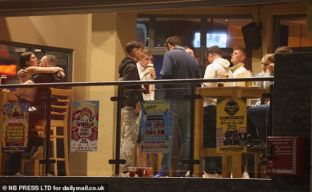 Young people drank on the balcony of a bar in Skegness last night as they kicked off the weekend