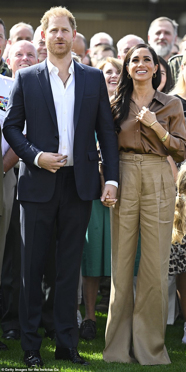 Meghan Markle wore wrinkled brown trousers during her trip to Germany with Harry last September